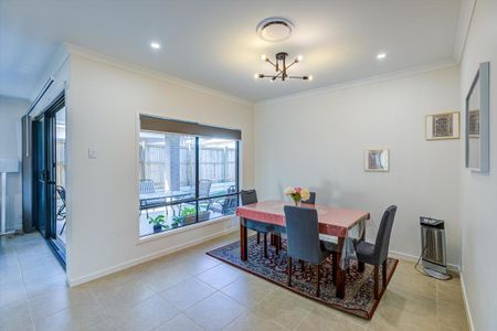 Spacious Family Home with Large Yard in Logan Reserve - Photo 4