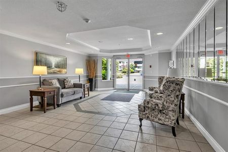 Spacious 55+ Condo with Elevator Access - Photo 3