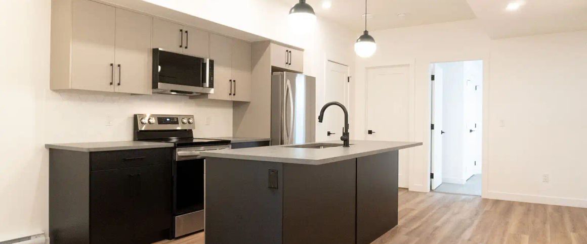 Brand New, Bright Basement Suite w/ In-Suite Laundry, Snow & Lawn Care Included — 1 Bedroom Duplex - Photo 1