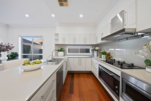 Modern Family Retreat in Coveted Cavenstone Estate - Photo 1