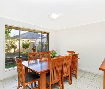 Open the Door To Easy-Care Living with Modern Comforts - Photo 4