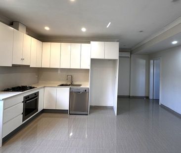 MODERN SPACIOUS TWO-BEDROOM LIVING IN GREENACRE - Photo 3