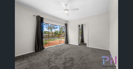 A REFRESHED FOUR BEDROOM HOME AWAITS YOU! - Photo 3