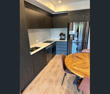 IMMACULATE UNIT TO SUIT PROFESSIONALS OR SMALL FAMILY - Photo 1