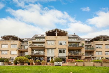 Gelijkvloers drie-slaapkamer appartement met zicht op de Golf van Brasschaat - Foto 2