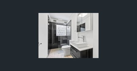 SENTATIONAL 1 BEDROOM APARTMENT WITH PRIVATE COURTYARD AND OFF-STREET PARKING! - Photo 5