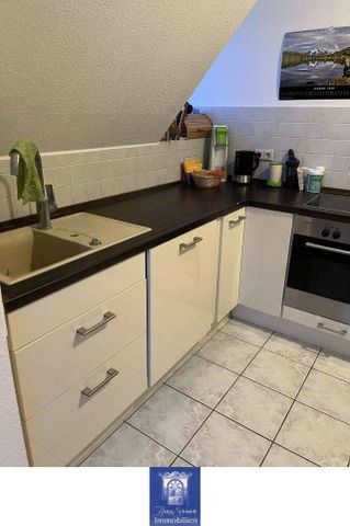 Charmante Dachgeschosswohnung in stilvoller Stadtvilla - Foto 3