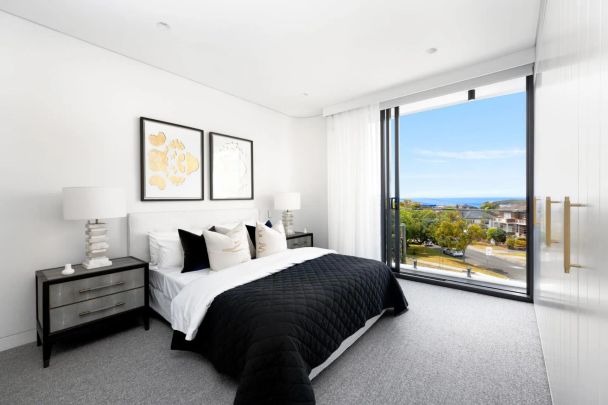 AS NEW LUXURY COASTAL HOME WITH LIFT SERVICING EACH FLOOR - Photo 1