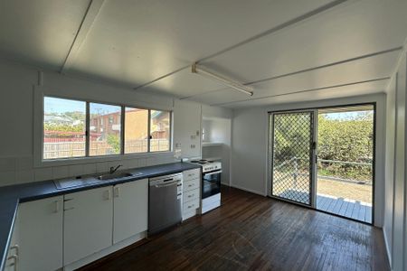 SPACIOUS QUEENSLANDER WITH EXTRA MULTI PURPOSE ROOM AVAILABLE NOW! - Photo 4