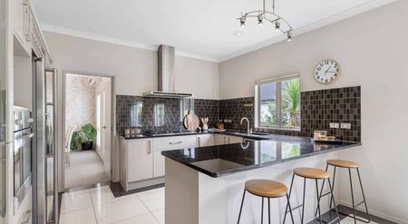 Spacious Family Living — 4 Bedrooms + Family Room + 2 Living Spaces - Photo 4