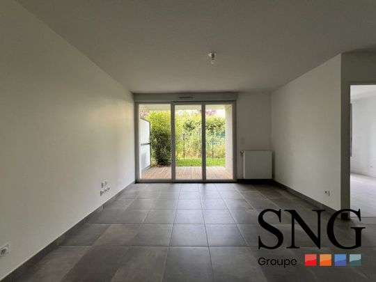 T2 AVEC JARDIN + 2 PARKINGS - Photo 1