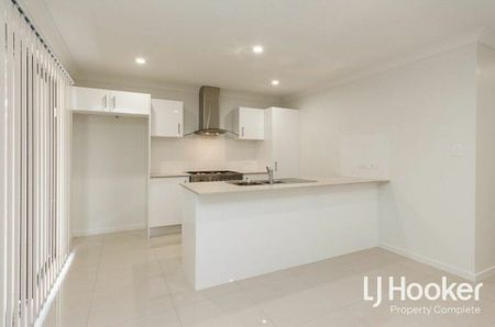 Modern Family Home with Stylish Finishes & Low-Maintenance Living - Photo 4