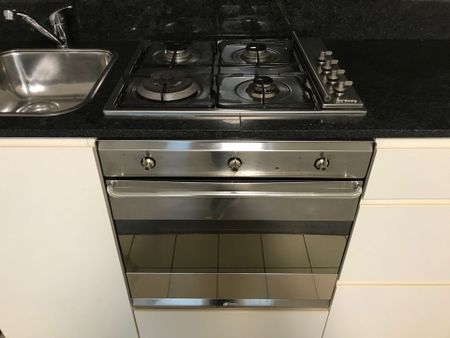 FURNISHED NORTH FACING LIGHT FILLED MODERN ONE BEDROOM APARTMENT IN THE QUADRANT! - Photo 2