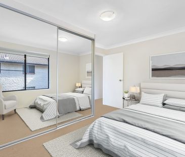 Light & Bright 2 Bedroom Apartment with Lock up Garage - Photo 4