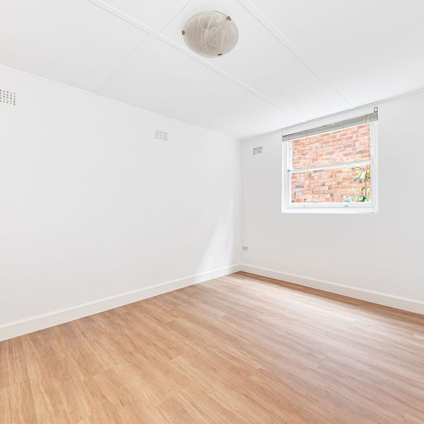 Renovated Two Bedroom Duplex in Convenient Location - Photo 1