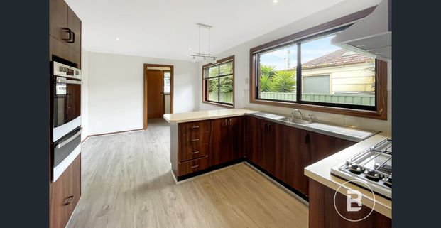 WELL KEPT THREE BEDROOM HOME IN PRIME LOCATION - Photo 1