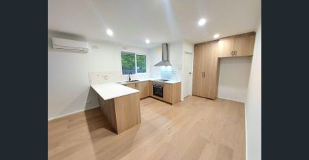 CONVENIENTLY LOCATED & STYLISH TWO BEDROOM UNIT - Photo 4