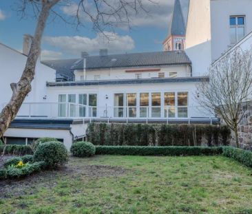 Direkt im Zentrum: 4-Zimmer-Wohnung mit großzügiger Terrasse und vi... - Foto 5