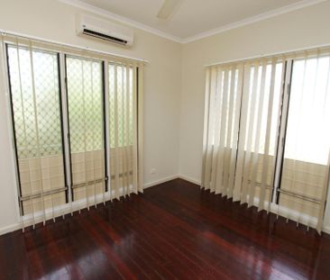 Elevated 5-Bedroom Home with Decked Balconies & Dual Living Spaces - Photo 2