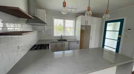 Modern inside, nice fully fenced back yard & large garage! - Photo 2