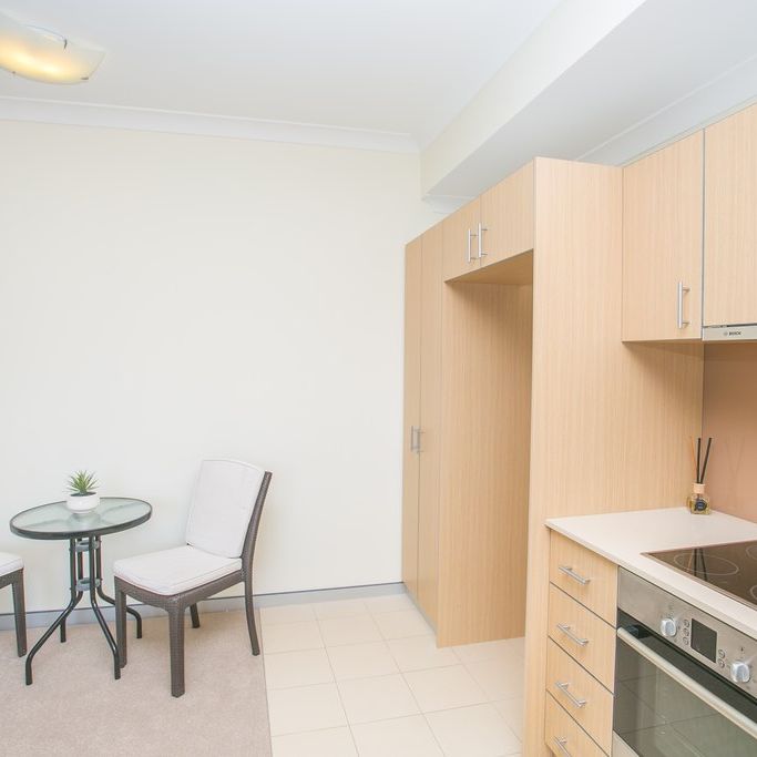 LOW MAINTENANCE SECURE APARTMENT IN PERFECT LOCATION - Photo 1