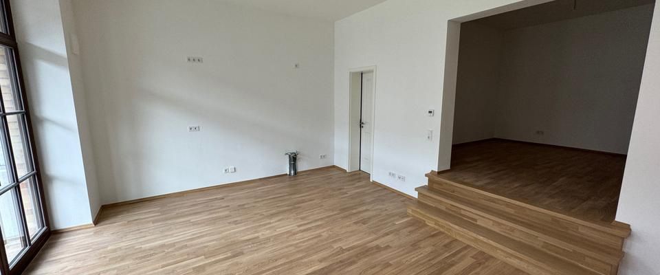 1-Raum-Wohnung mit Wohn-Essküche und Treppe zum Schlafbereich- WE21 - Photo 1
