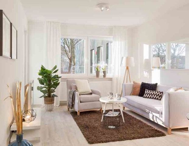 Reinkommen und Wohlfühlen: ansprechende 3-Zimmer-Wohnung - Foto 1