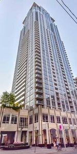 COLLEGE PARK: Large 2 Bedroom+Den Condo For Rent Toronto - Photo 4