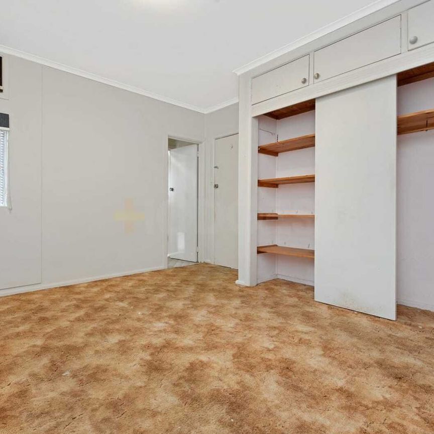 Register to Inspect / Spacious 4-Bedroom Home with Large Backyard in Prime Location - Photo 1