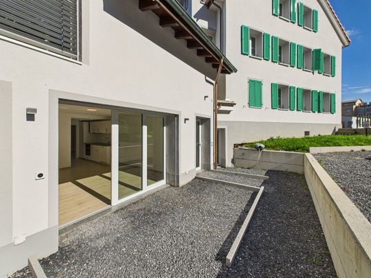 Gemütliche 2.5-Zimmer-Wohnung im Erdgeschoss - Foto 1