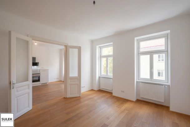 Sanierte 2 Zi.-Altbauwohnung zur unbefristeten Miete: Wohnküche + 1 Schlafzimmer | U1 Troststraße | Top 21-22 - Photo 1