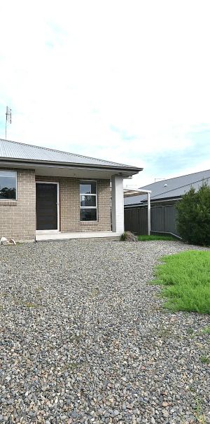 Near New 2-Bedroom Duplex with Modern Comfort - Photo 1