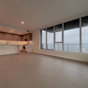 GILMORE PLACE - BRAND NEW 2B2B+DEN 55TH FLOOR - Photo 2