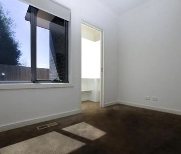 MODERN UNIT WITH PRIVATE COURTYARD AND CARPORT - Photo 4