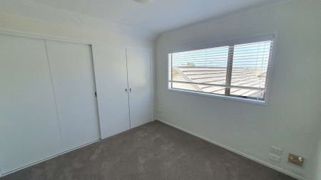 Sunny, spacious end unit - Photo 4