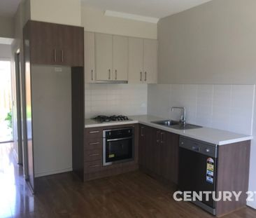 Stylish & Low-Maintenance Townhouse in a Convenient Location - Photo 2