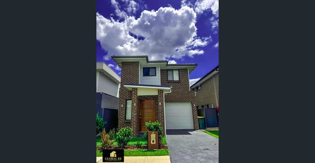 Immaculate 4-Bedroom Home In The Heart Of Gregory Hills - Photo 1