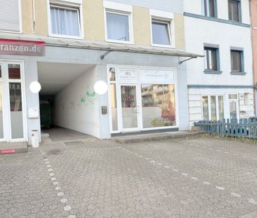 Helle Wohnung auf zwei Ebenen mit eigenem Keller und Außenstellplatz - Foto 1