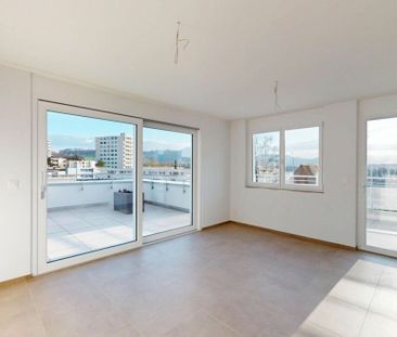 Exklusive 3.5-Zimmer-Attikawohnung im Erstbezug mit 98 m² Sonnenterrasse - Photo 1
