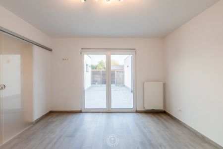 Ruim en energiezuinig gelijkvloers appartement op wandelafstand van de Schelde - Photo 2