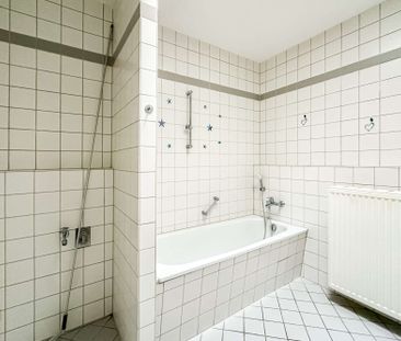 Charmante Dachgeschosswohnung mit Süd-West Terrasse in ruhiger Lage! - Photo 3