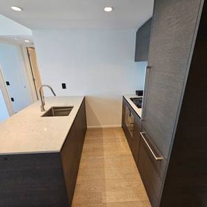 BRAND NEW 1 BED + DEN *LANDMARK ON ROBSON* - Photo 2