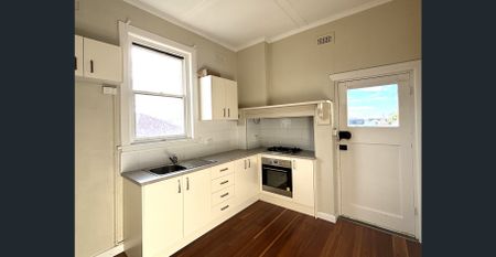 Spacious Renovated Unit - Photo 2