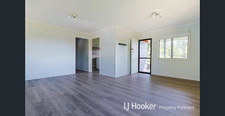 Family-Friendly Comfort with Large Backyard & Renovated Interiors - Photo 2