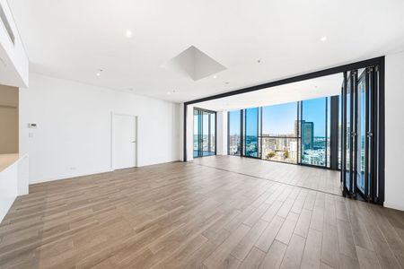 Luxury Three-Bedroom Penthouse with Private Rooftop and Panoramic Water Views - Photo 3