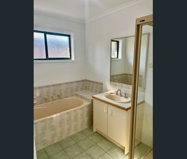 FOUR BEDROOM FAMILY HOME WITH SOLAR - Photo 4