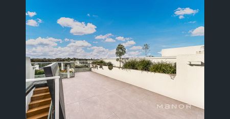 Stylish Dual-Level Residence in the Heart of Rouse Hill - Photo 5