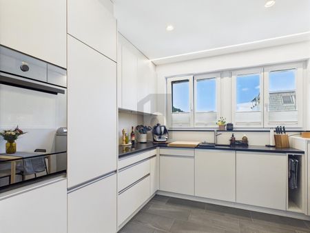 LIGHT-FLOODED WITH A LARGE BALCONY - Photo 3