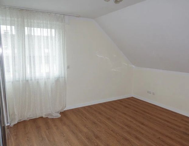 Großzügige DG-Wohnung für 2 Personen mit Einbauküche, Garage,großer Loggia mit Blick zum Fleyer Wald - Foto 1
