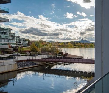 Fully Furnished Executive Apartment with Lake Views - Photo 3